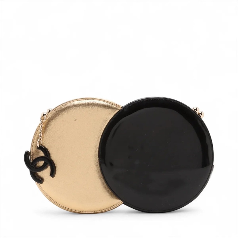 Chanel gold and black circle clutch